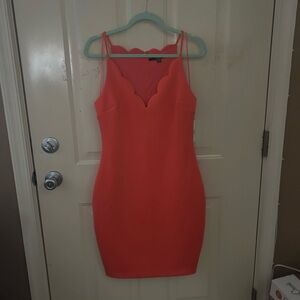Guess cocktail dress. Size medium. Brand new with tags. Color- Coral.